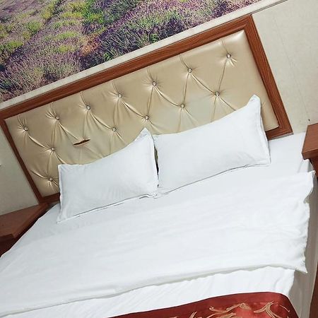 Song Xing Hotel Муанг-Сай Экстерьер фото