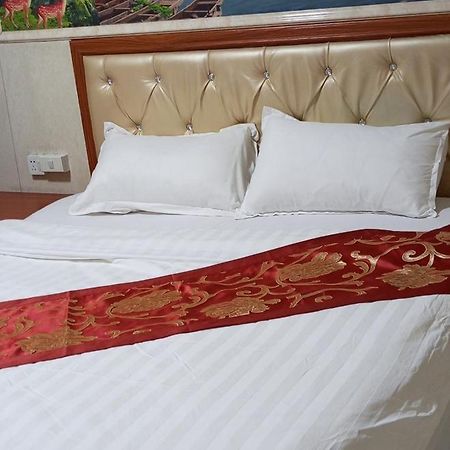 Song Xing Hotel Муанг-Сай Экстерьер фото