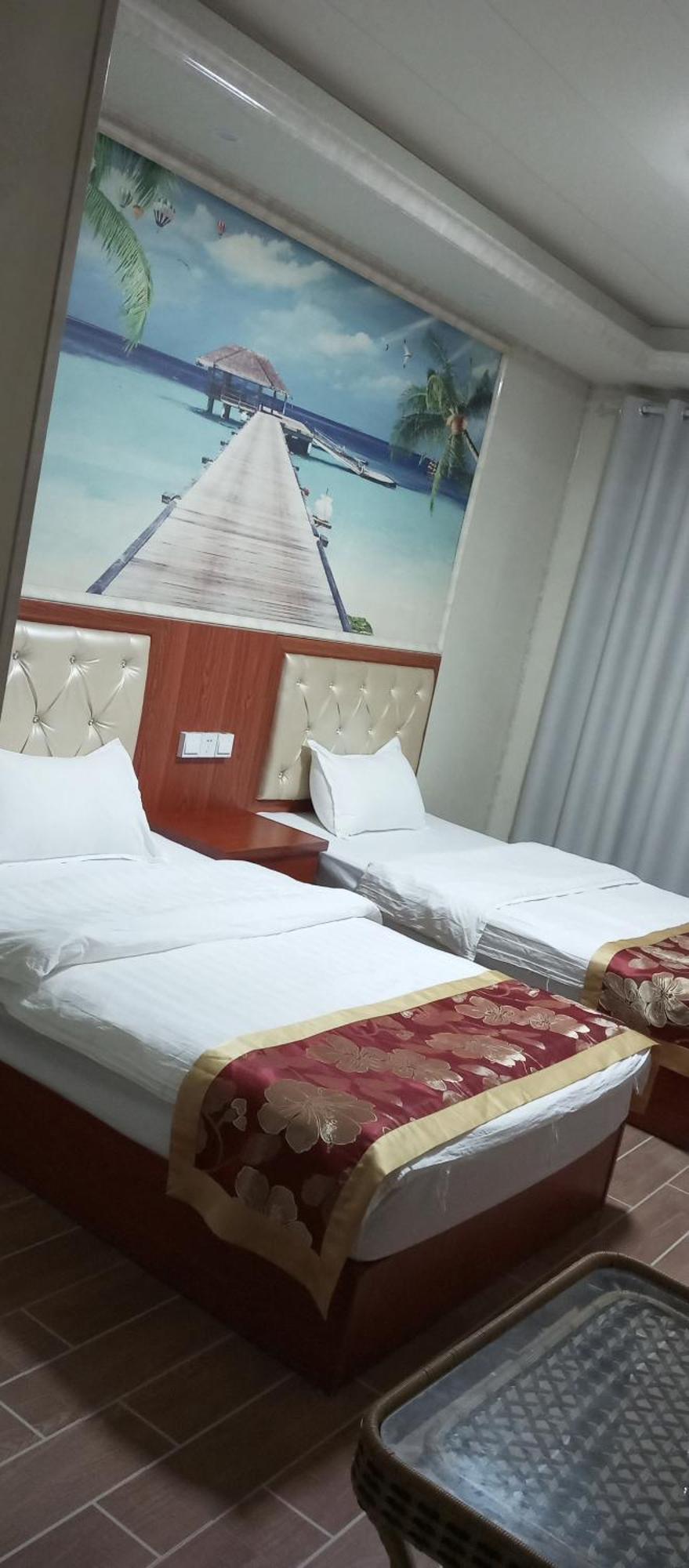 Song Xing Hotel Муанг-Сай Номер фото