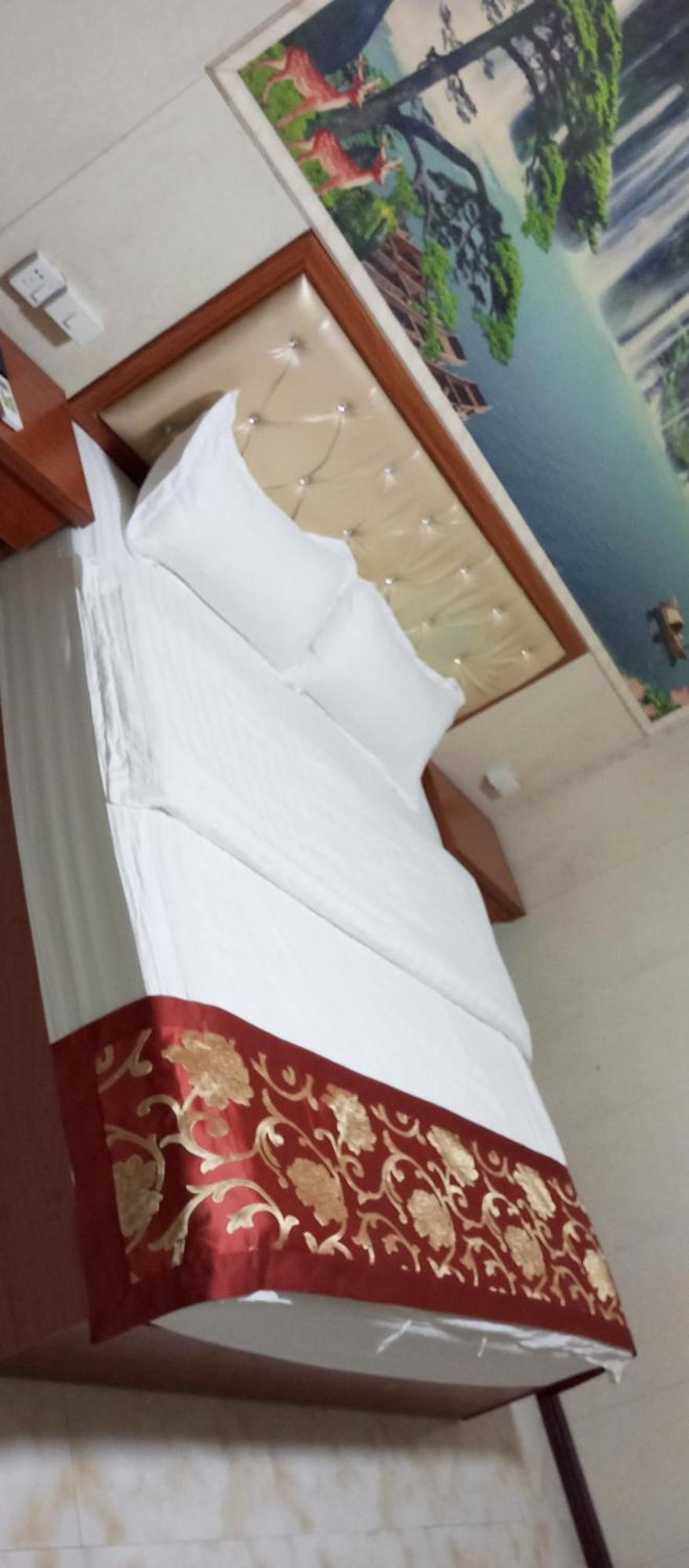 Song Xing Hotel Муанг-Сай Экстерьер фото